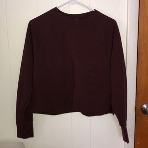 maroon cropped sweater from Nike